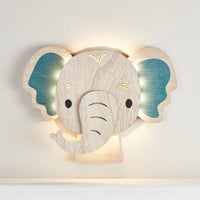Wandlampe aus Holz in Elefantenform mit sanftem Licht für das Kinderzimmer.