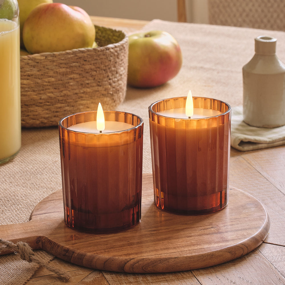 2er Set TruGlow® LED-Kerzen im geriffelten Glas in Orange mit Fernbedienung